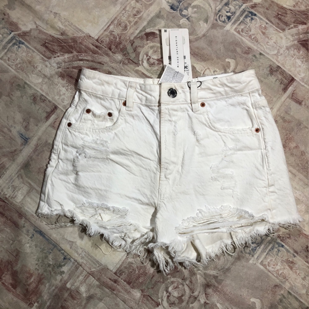 Women’s Distressed White Denim Shorts